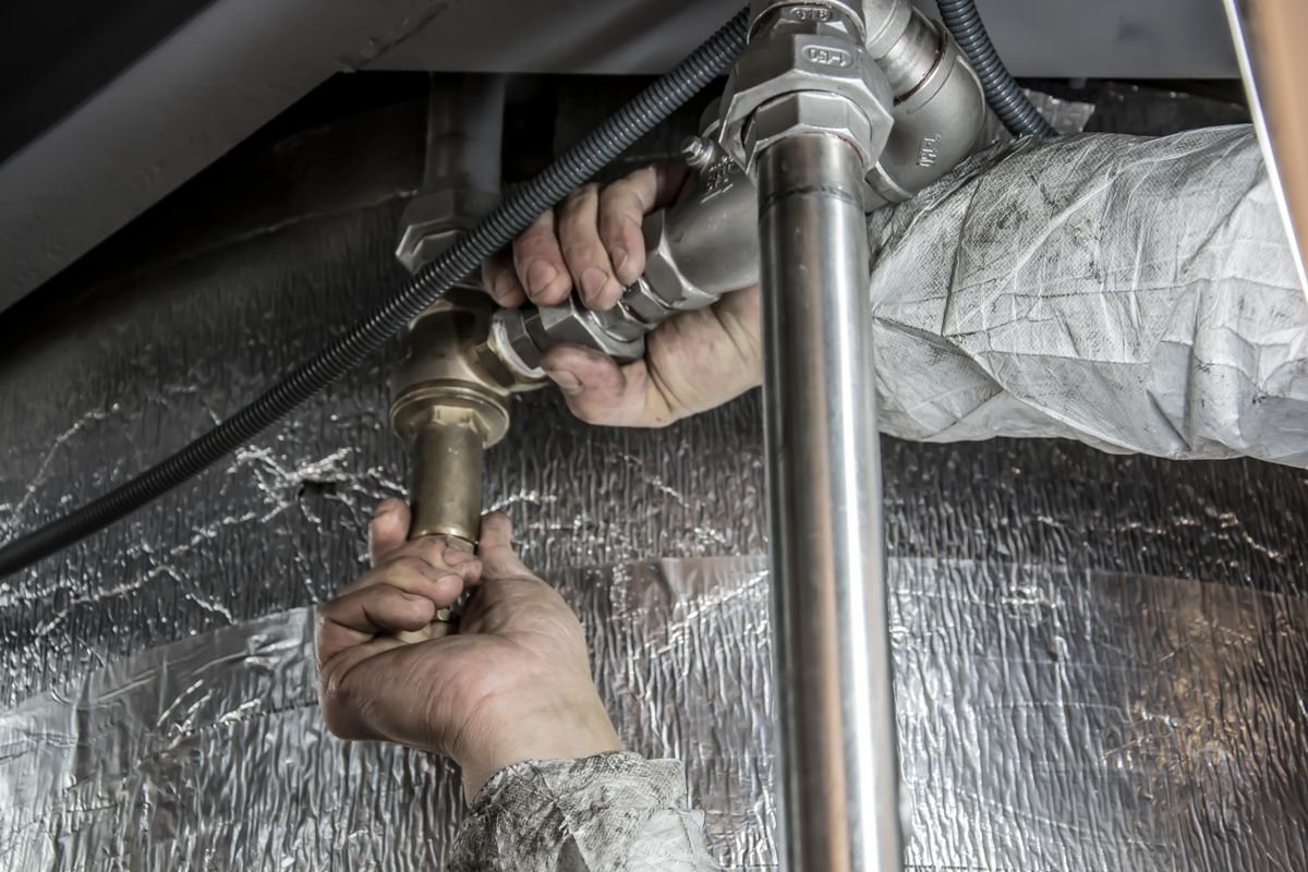 Septic technician servicing a system